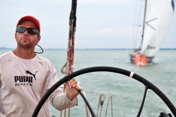 Chris Nicholson steering Puma Racing in the Volvo Ocean Race